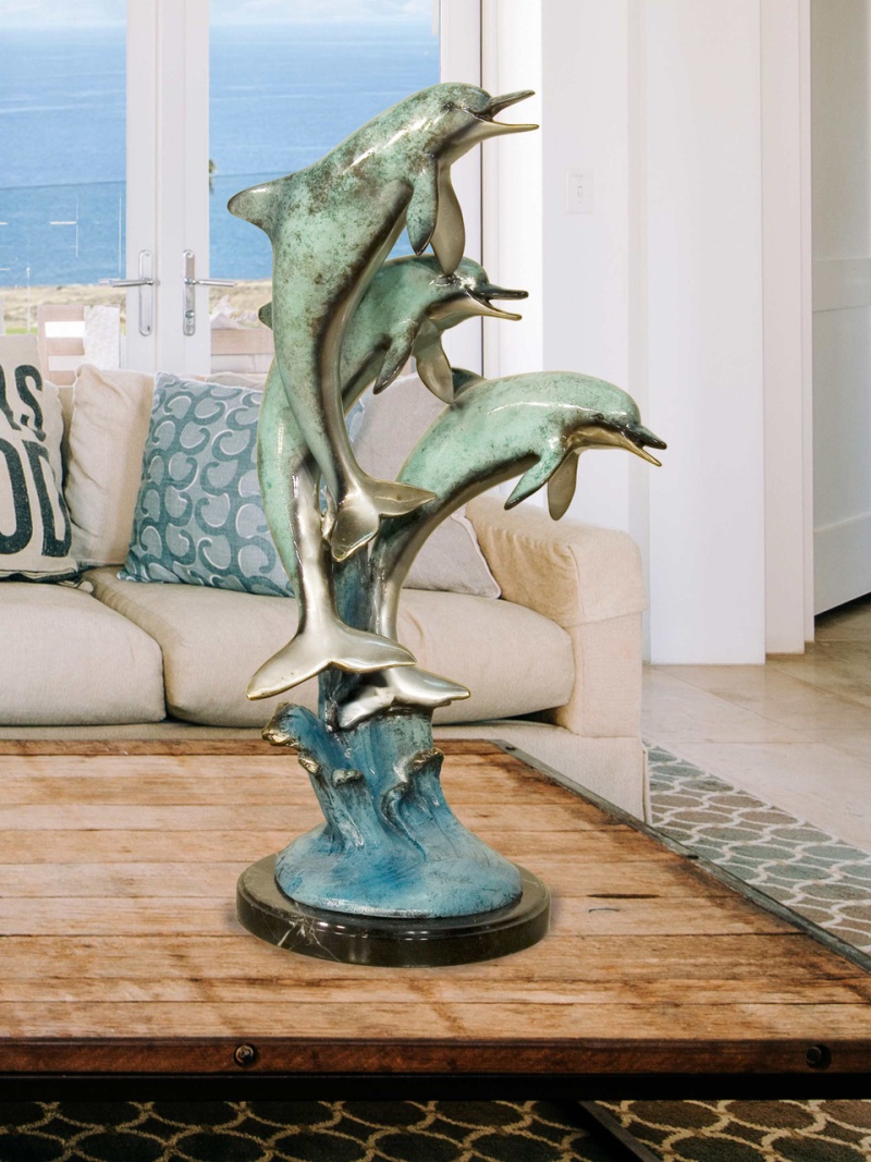 Three Jumping Dolphins On Marble Base