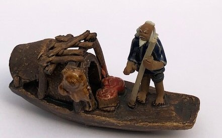 Ceramic Figurine Man On Sampan Boat 3"
