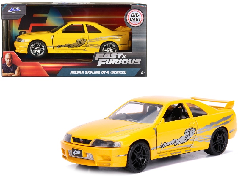 Leon's Nissan Skyline GT-R (BCNR33) Yellow Metallic Diecast Model Car